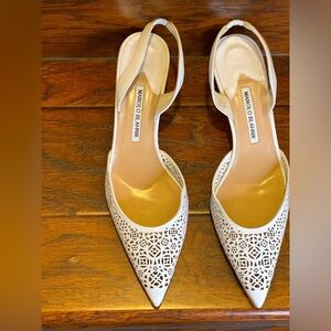 Manolo Blahnik
Carolyn Laser-Cut Patent Low-Heel Halter Pump, White. Sz 41